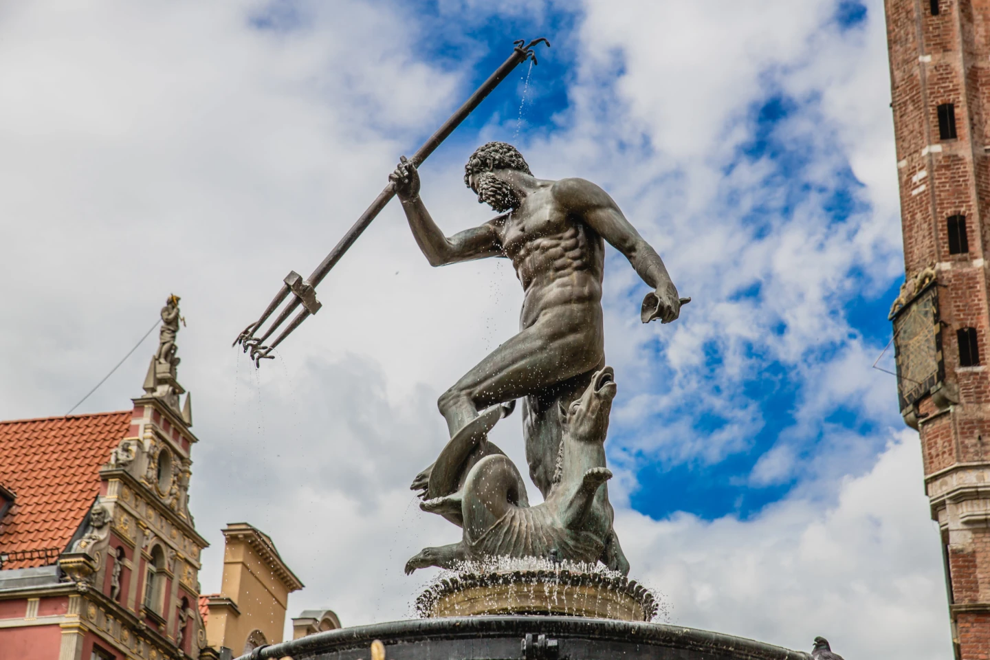 Neptune Fountain in Gdansk with Clear Blue Sky, Poland Landmark